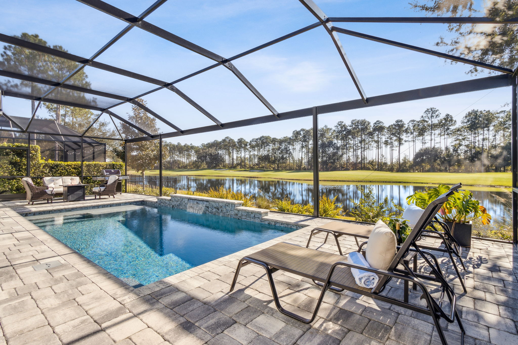 The pool is surrounded with durable and stylish pavers...