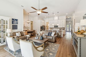 ...and connects to the expansive and inviting heart of the home - note the 12 ft. ceilings.