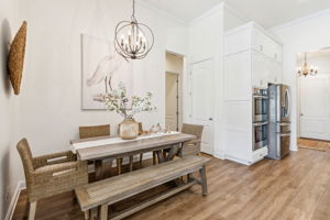 A recessed alcove provides a large dining space ...