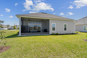 Spacious backyard offers plenty of room for a play area, garden or future pool.