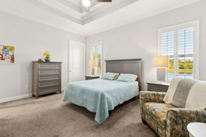 Spacious primary suite featuring a luxurious layout,