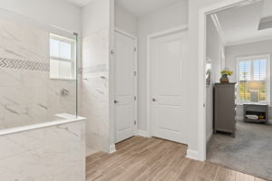 showcasing a tiled shower