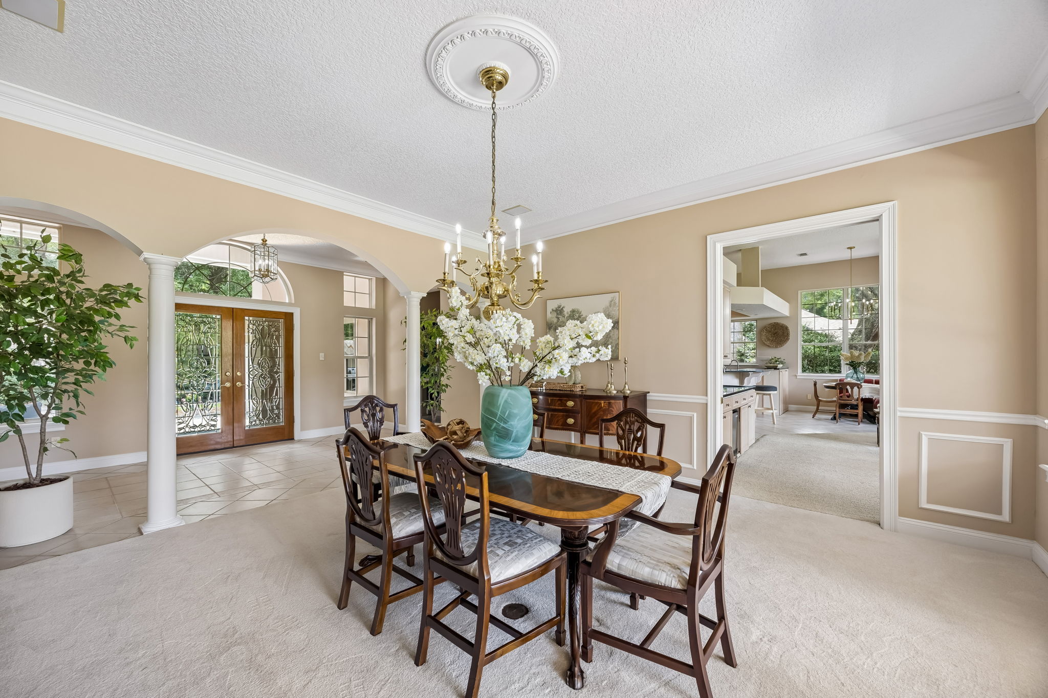 From the dining room, the floor plan begins to unfold with an easy sense of connection…