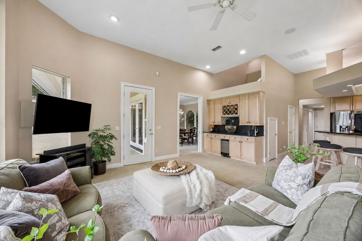 …opening into a generous gathering space where everyday living, entertaining, and the kitchen all come together.