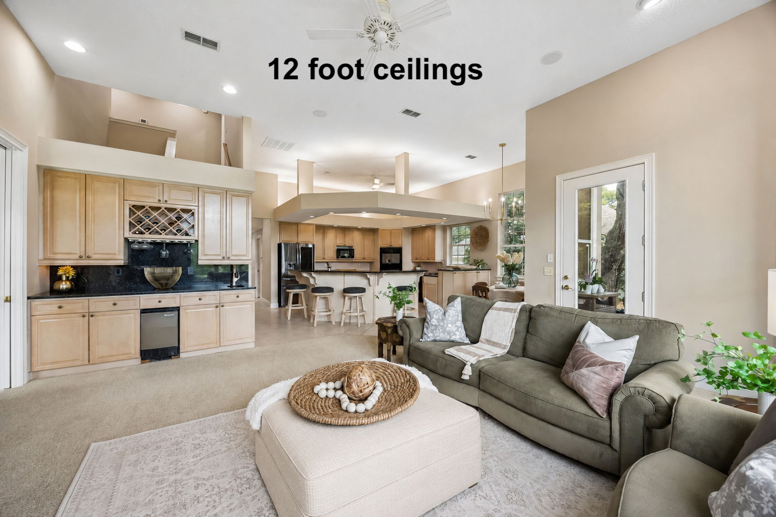 With 12-foot ceilings and an automated Lutron lighting system, the space is designed for comfort, scale, and ease.