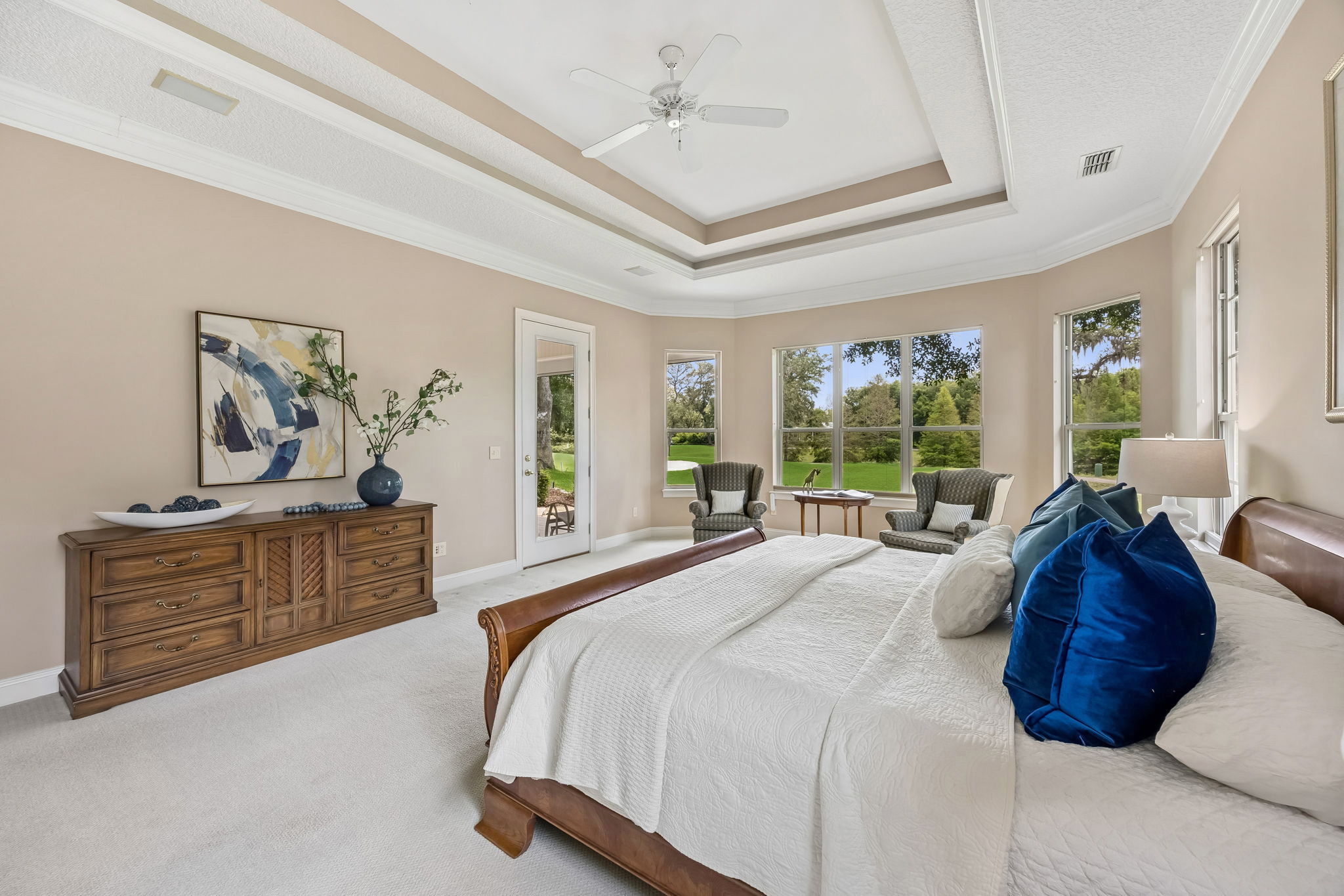 …with generous scale, golf course views, and direct access to the outdoor living space.