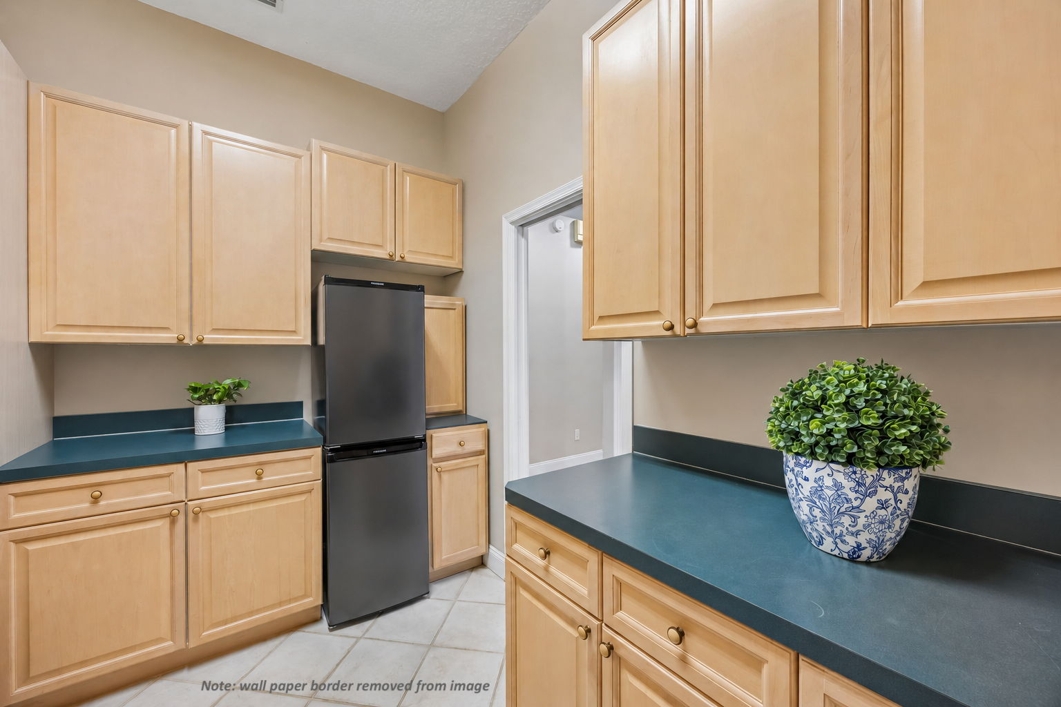 …with cabinetry, counter space, and room for extra refrigeration that make the home live even more efficiently.