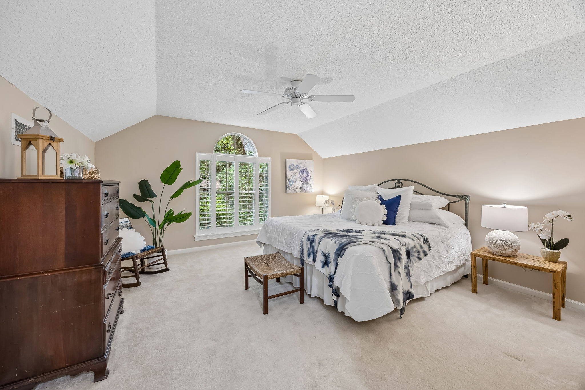 Upstairs, guests enjoy a spacious bedroom with its own private bath and walk-in closet.