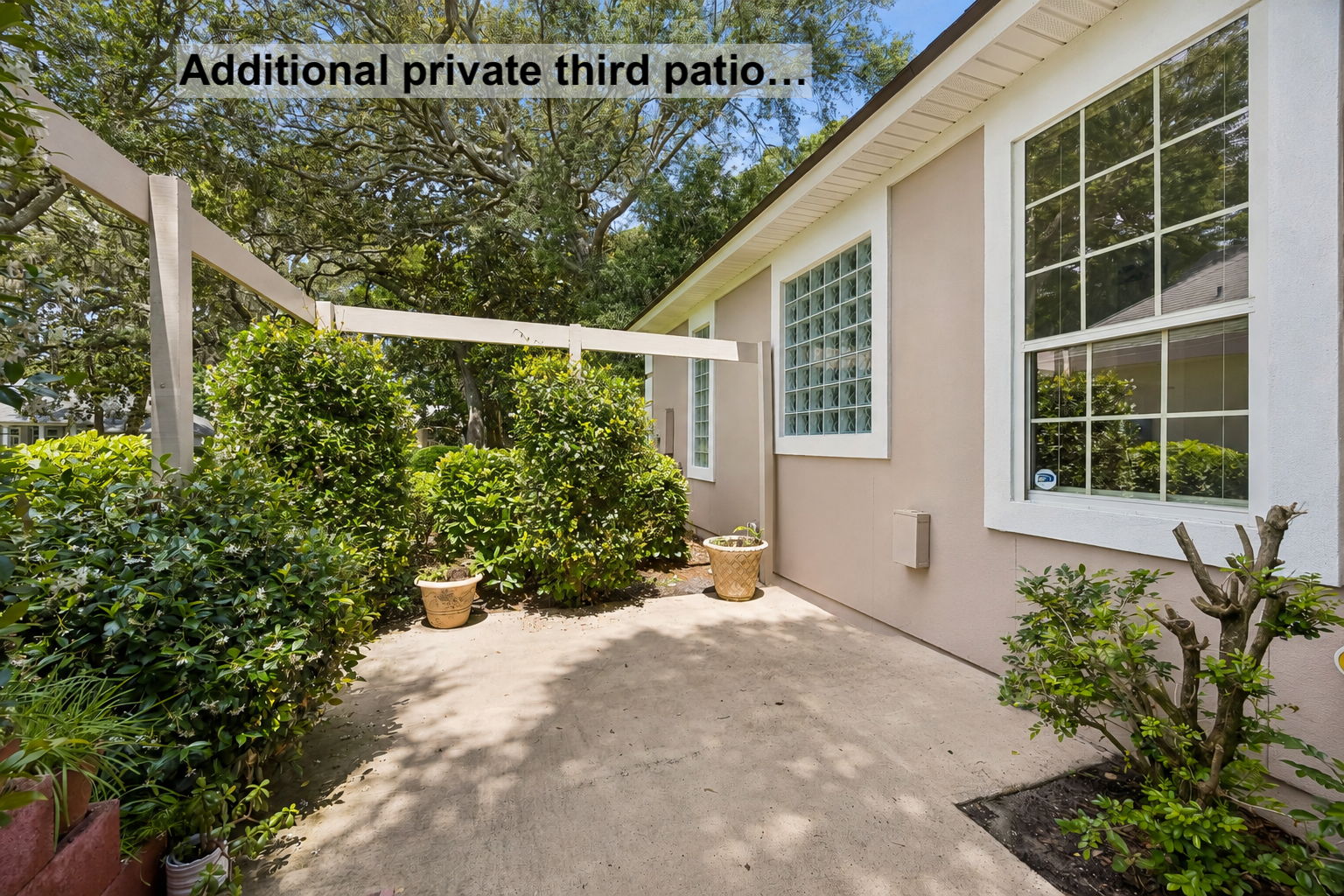 A third private patio adds another quiet outdoor retreat…