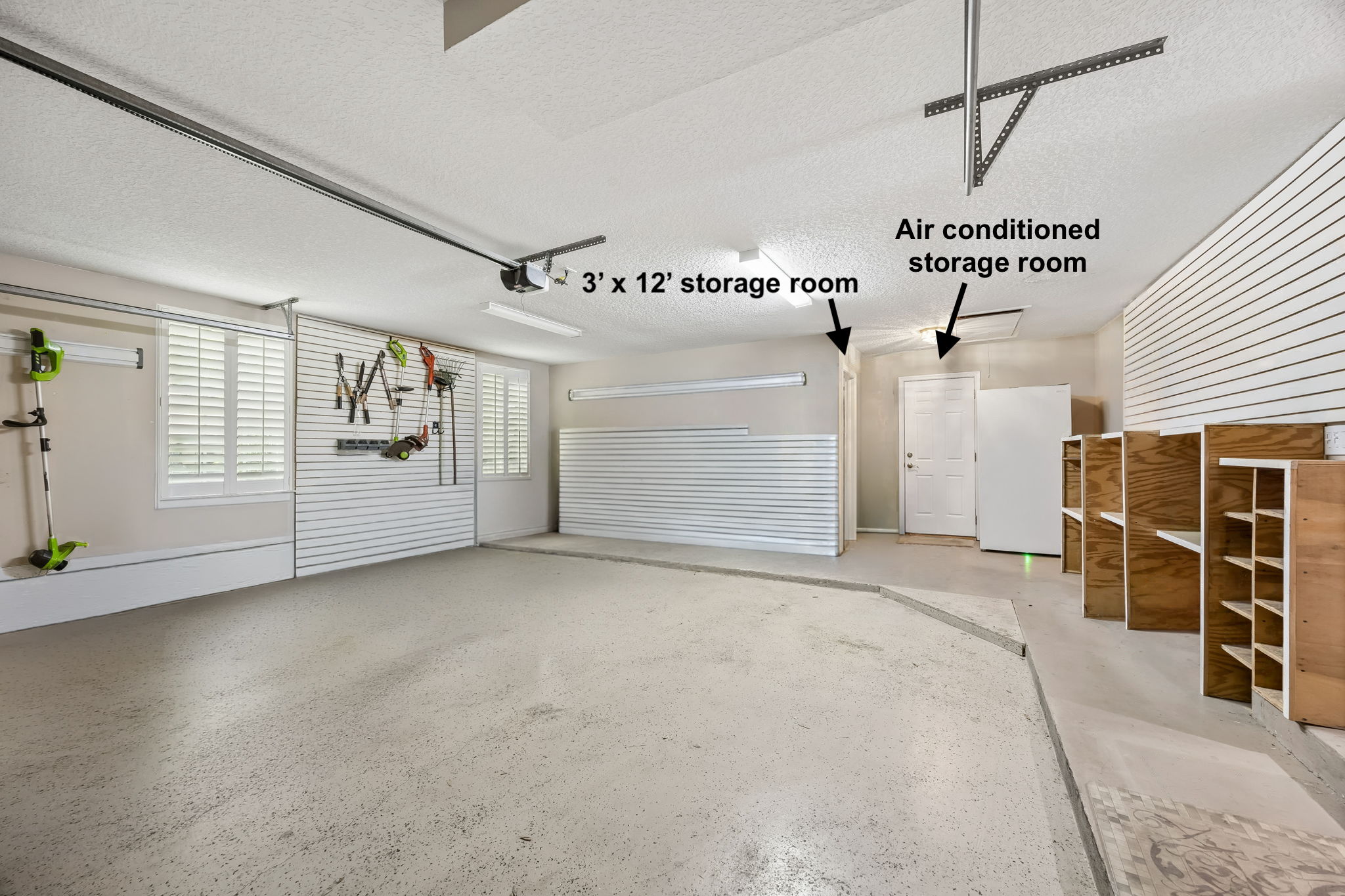 The oversized garage offers serious functionality, with clean storage space, easy household overflow, and a sealed, spray-foamed attic for added efficiency above.