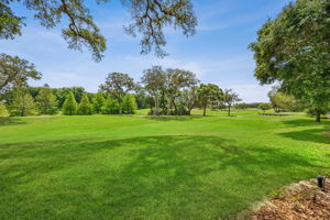 Wide fairway frontage gives the home a rare sense of openness, privacy, and green space...