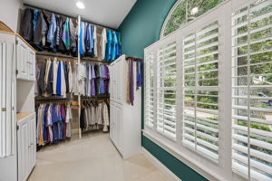 The oversized primary closet is a standout, with three levels of hanging space for effortless seasonal wardrobe rotation.
