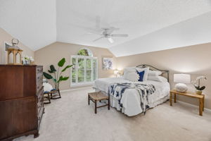 Upstairs, guests enjoy a spacious bedroom with its own private bath and walk-in closet.