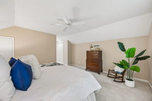 Vaulted ceilings and generous proportions give the room a comfortable, tucked-away feel.