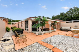 Rear and Side Courtyards with Extended Covered Deck