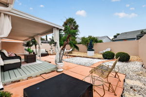 Rear and Side Courtyards with Extended Covered Deck