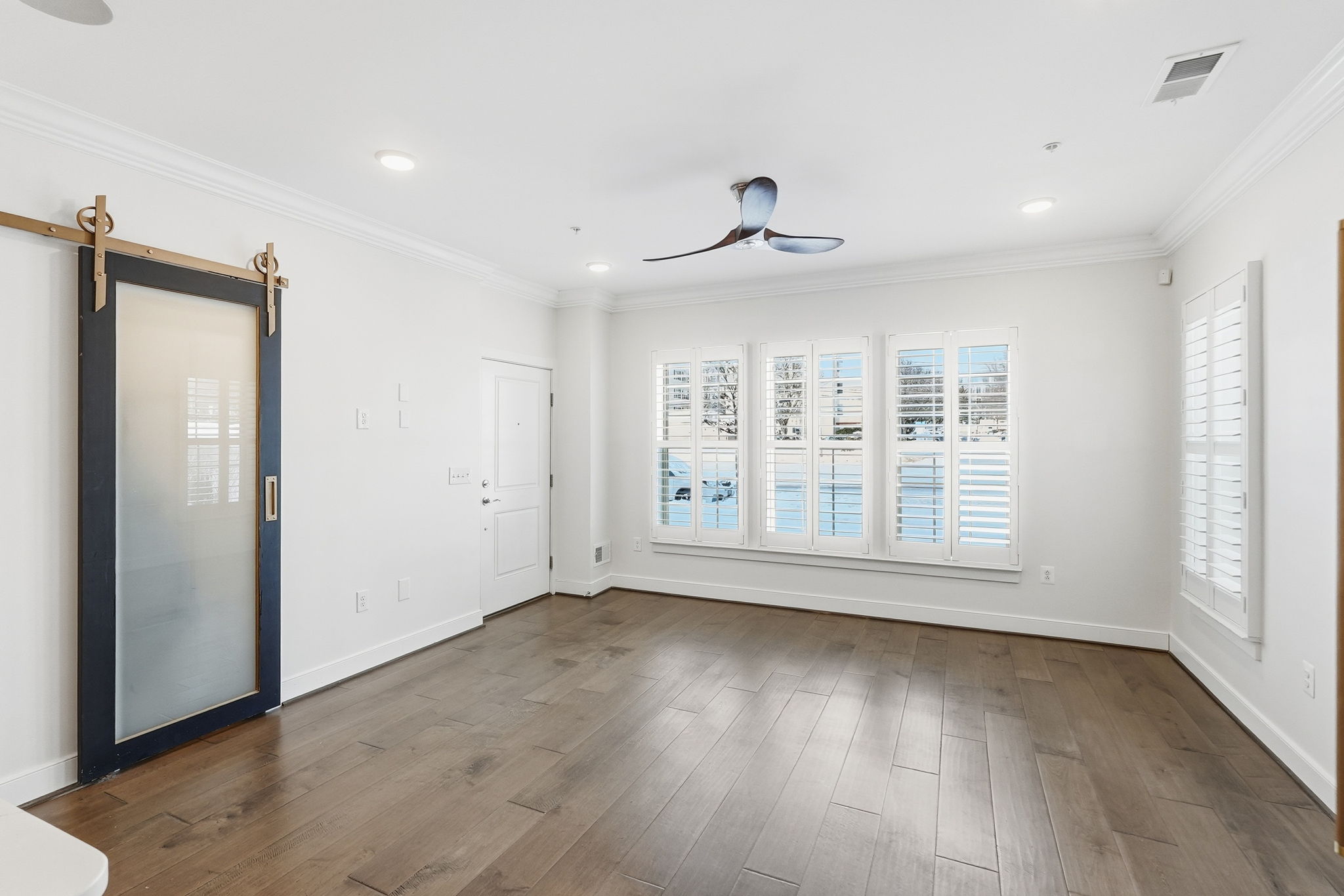 Living Area with Sliding Barn Door to Pantry