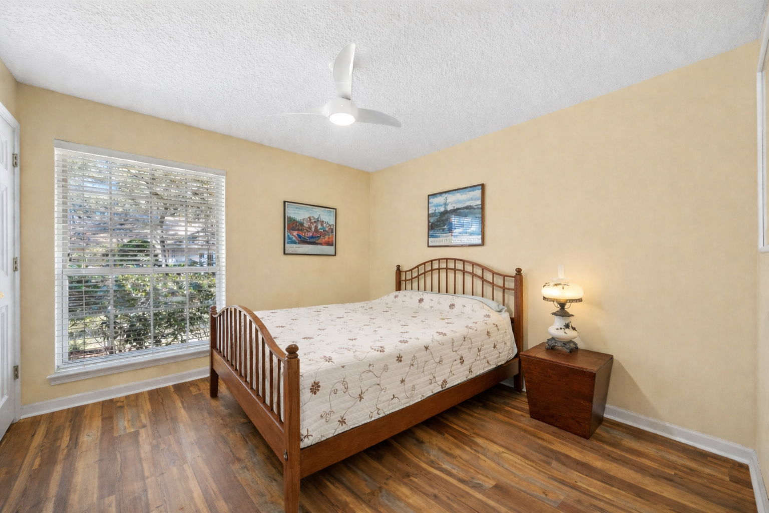 A bright, well-sized guest bedroom offers comfort for family and visitors alike.