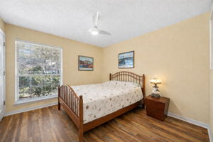 A bright, well-sized guest bedroom offers comfort for family and visitors alike.