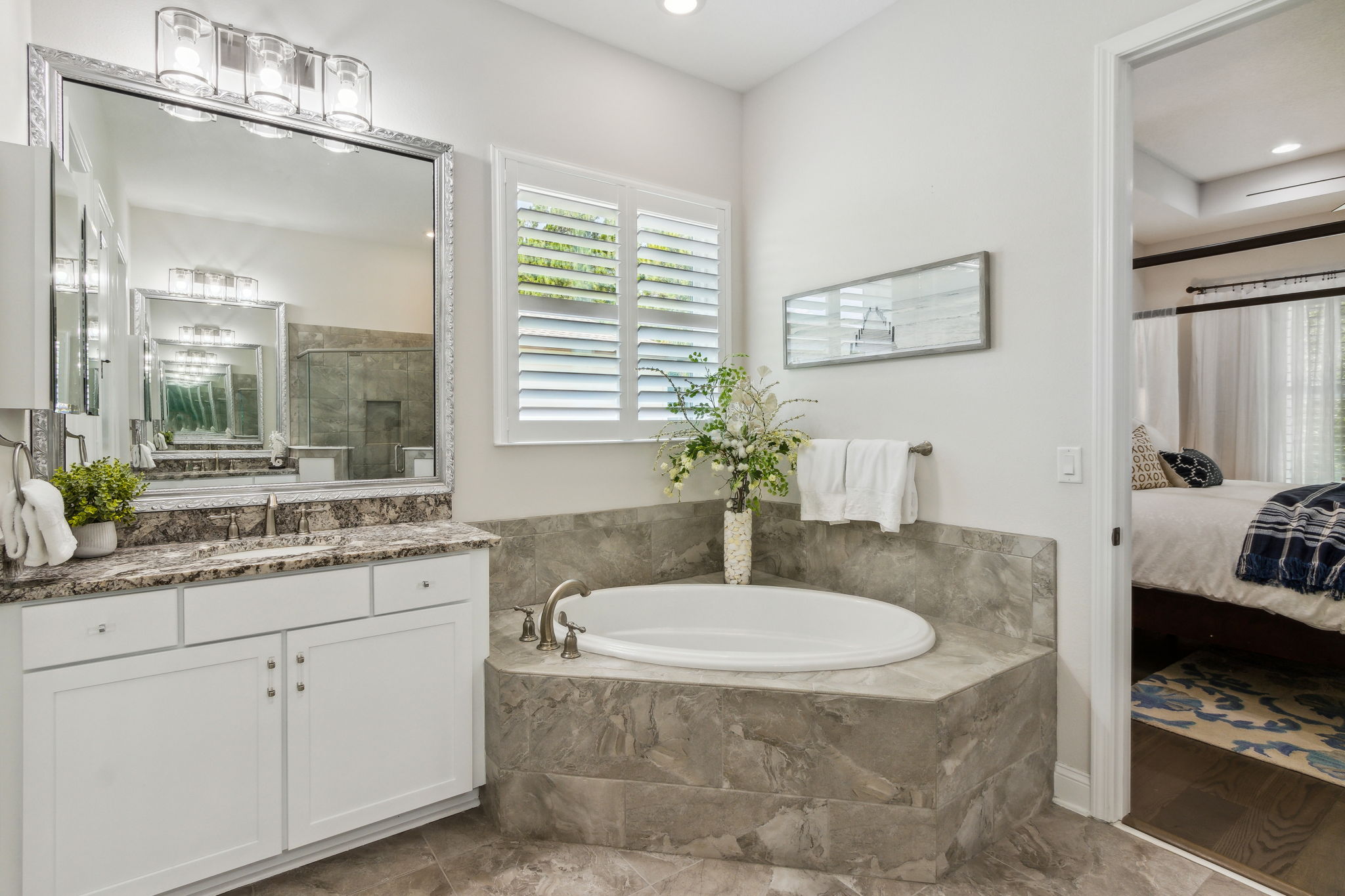 Note upgraded framed mirrors throughout all baths