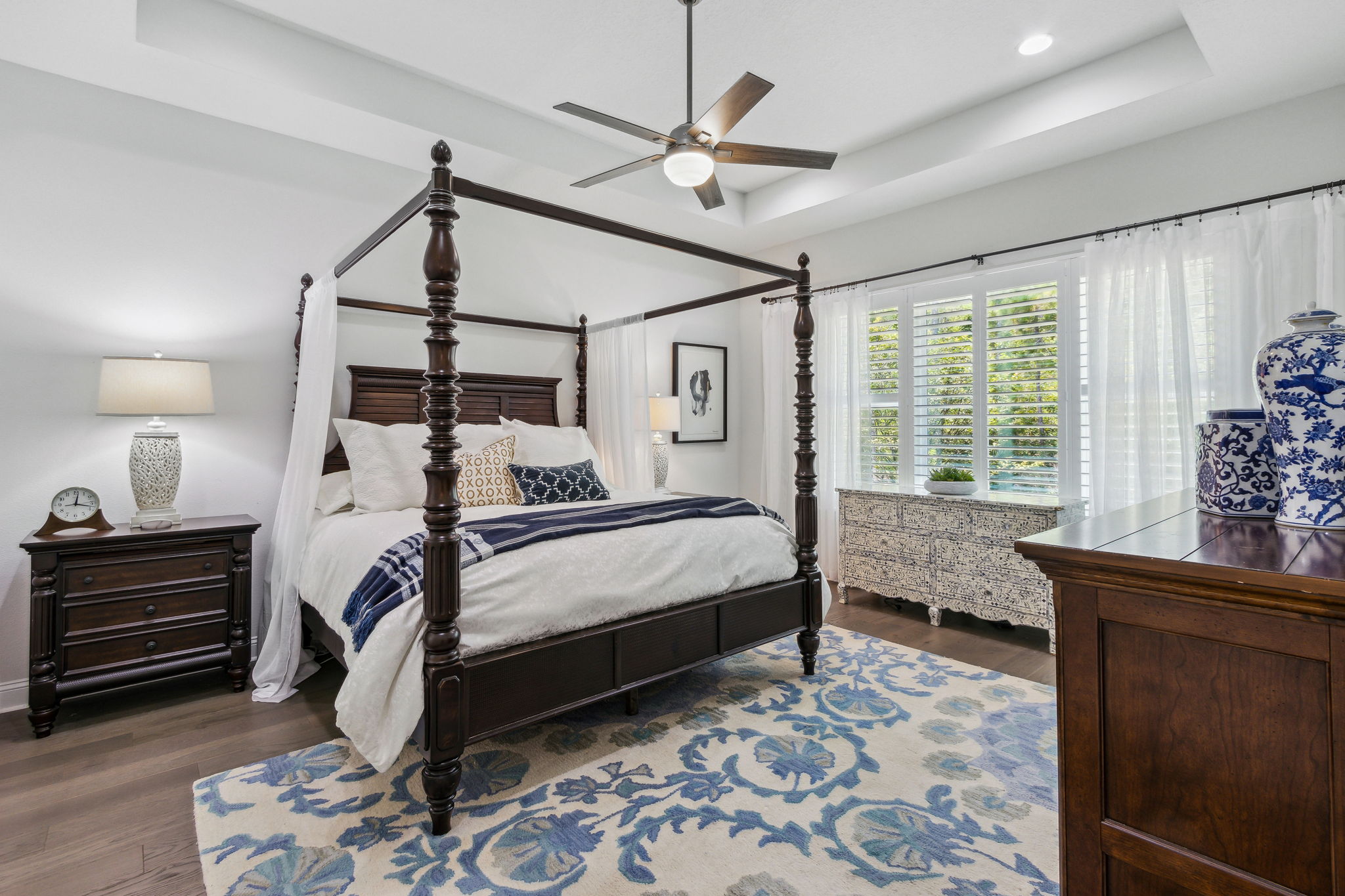 Upgraded tile floors continue in the master suite