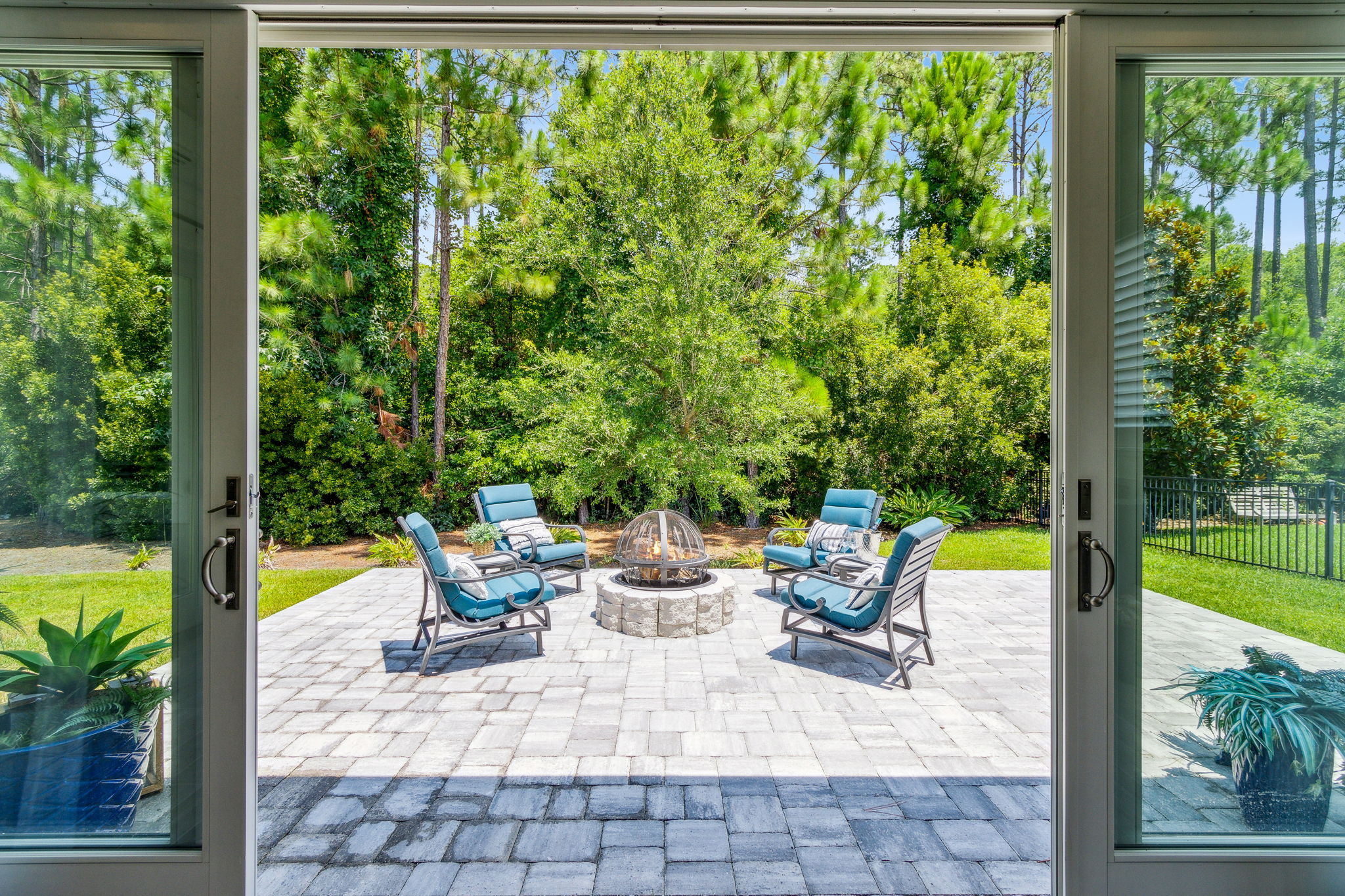 Exit from the lanai onto your expansive paver patio...