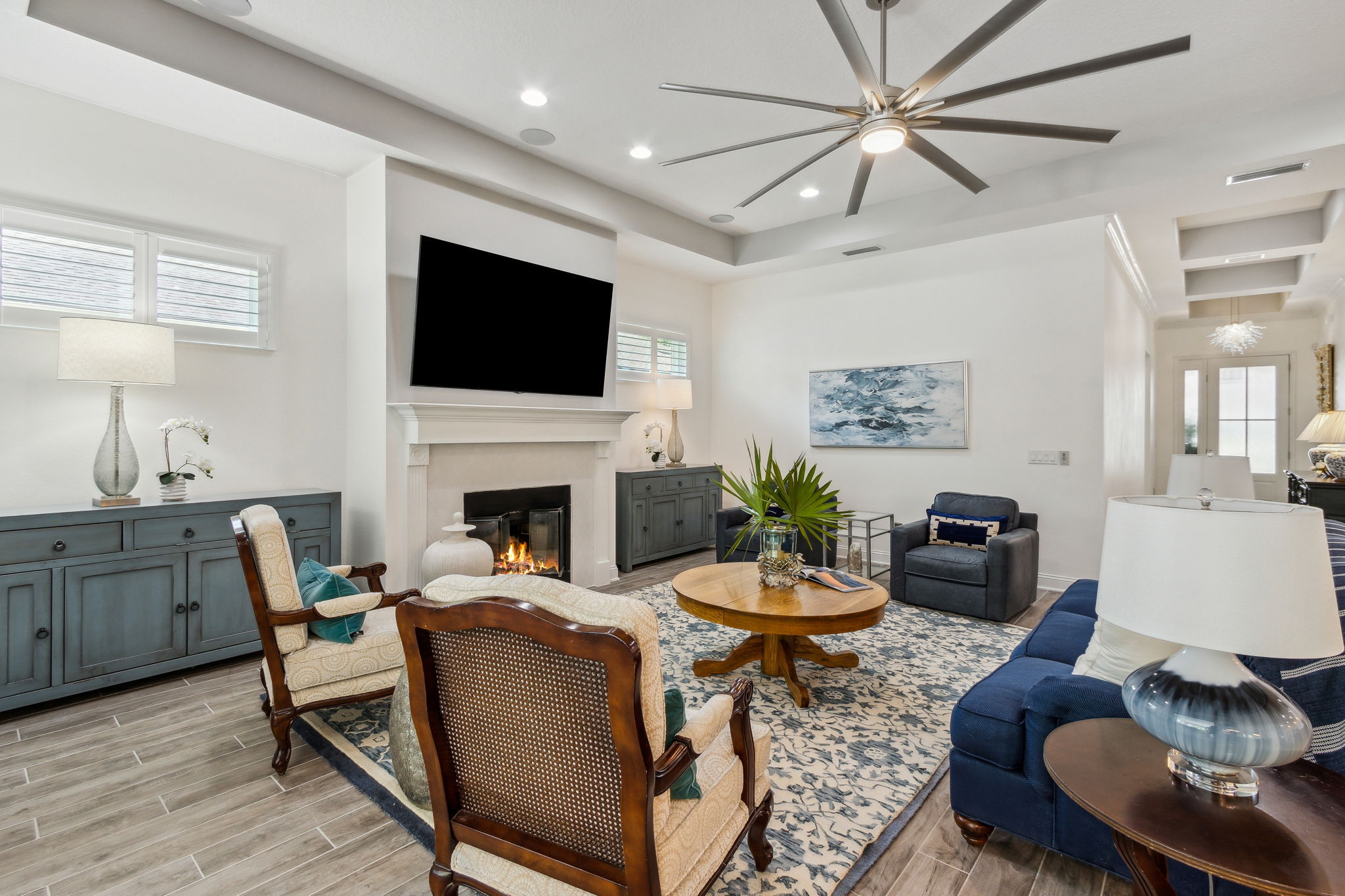 The family room is beautifully accented with a newly upgraded gas fireplace and mantel