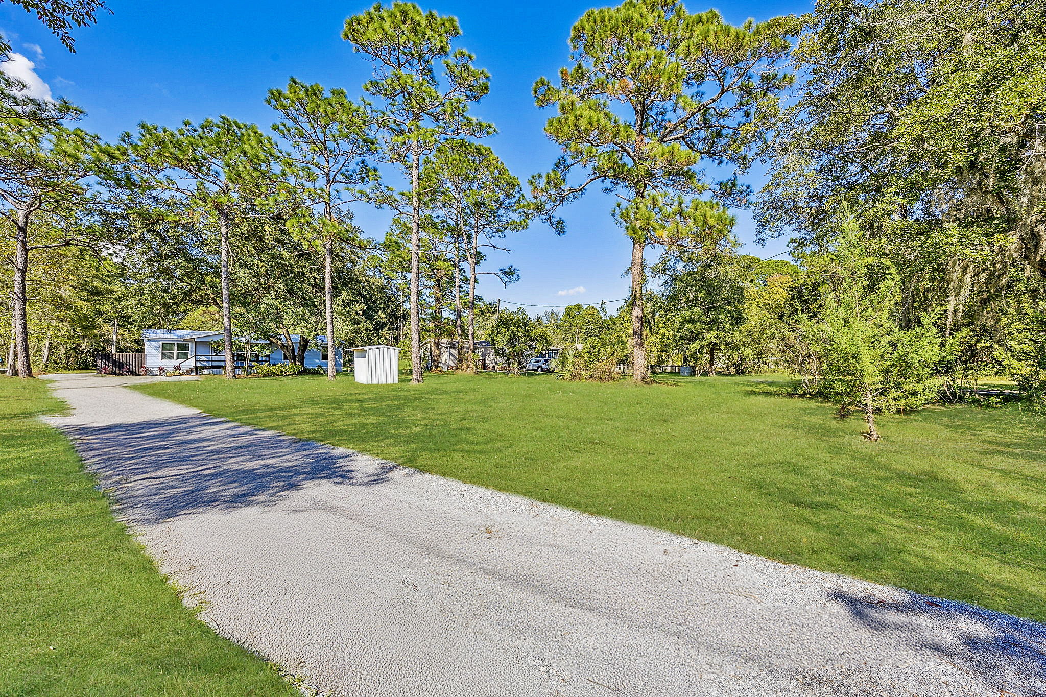 ...a new gravel driveway and landscaped yard