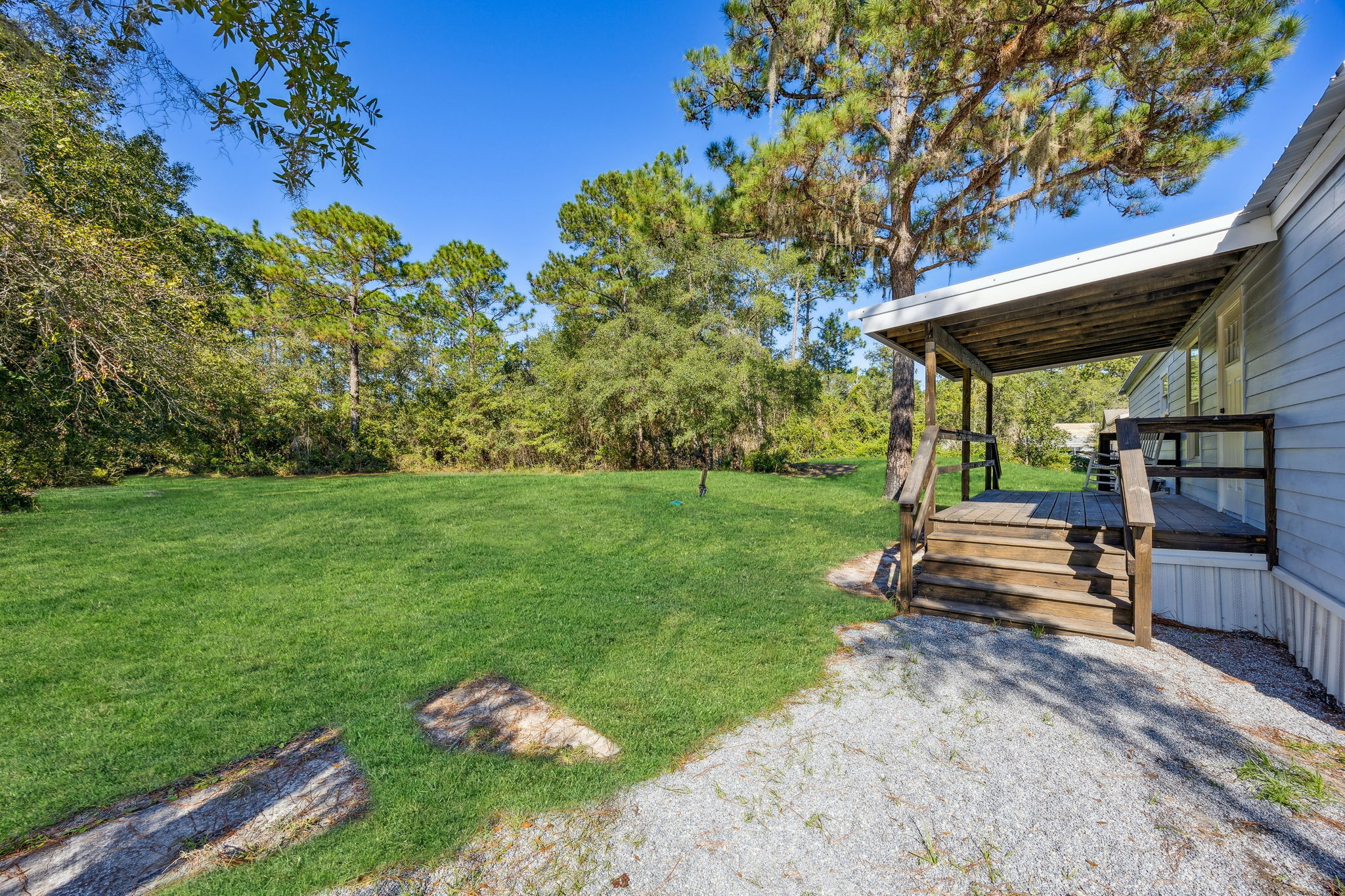 ... and overlooks a large and private backyard ...