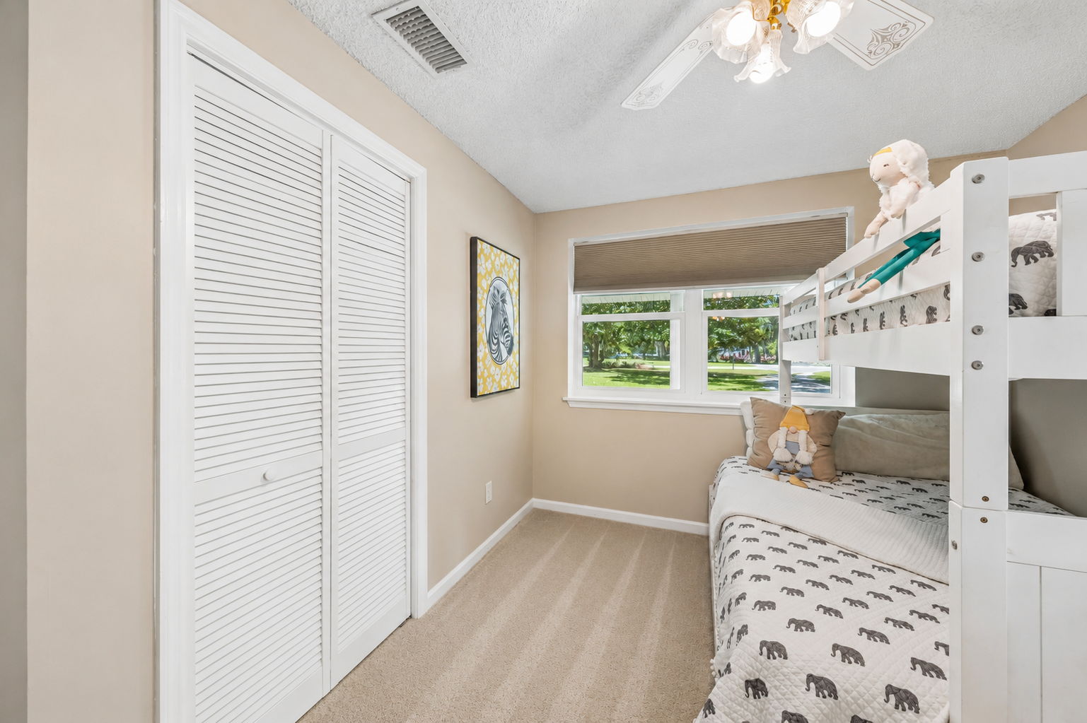 … with a full closet and windows on two sides adding storage and natural light.