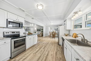 ...  the open layout keeps the home connected to both the view and the people in it.