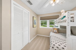 … with a full closet and windows on two sides adding storage and natural light.