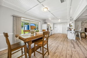 … while its open connection to the kitchen keeps meals and conversation flowing easily.