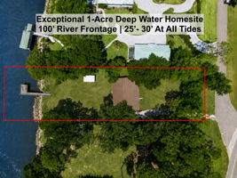 Exceptional 1-acre deep-water homesite with 100' of river frontage and 25–30' of water at all tides.