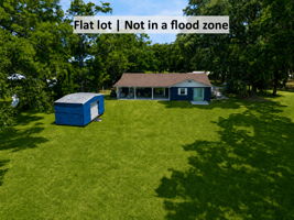 Flat, usable land outside the flood zone creates an ideal canvas for a future custom home...