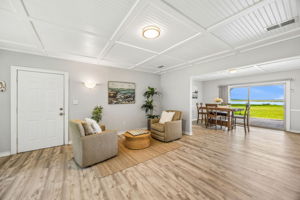 Inside, the open living spaces feel comfortable and casual, with the water always part of the view...
