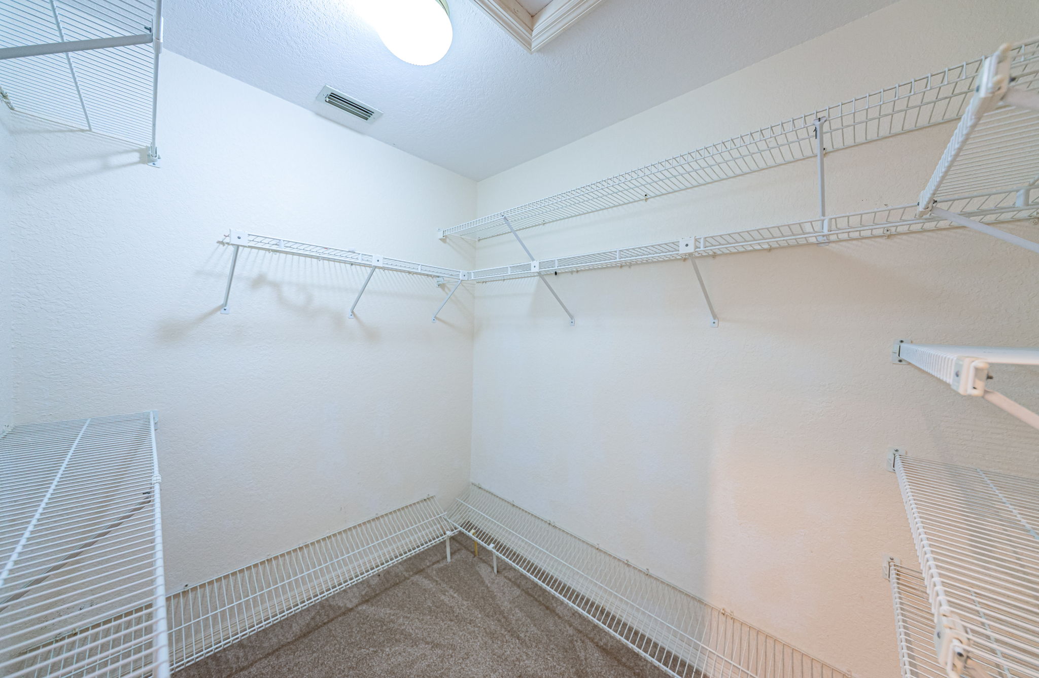 Primary Bedroom Walk-in Closet