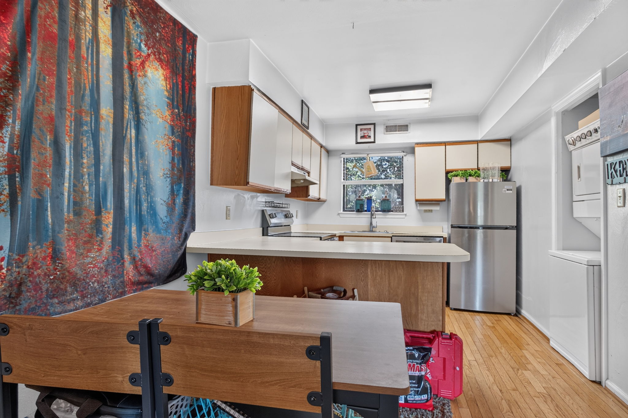 KITCHEN OPEN TO DINING & LIVING ROOM