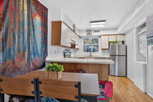 KITCHEN OPEN TO DINING & LIVING ROOM