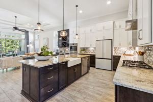 A true chef's kitchen with gas cooking, double ovens, and plenty of counter space ...