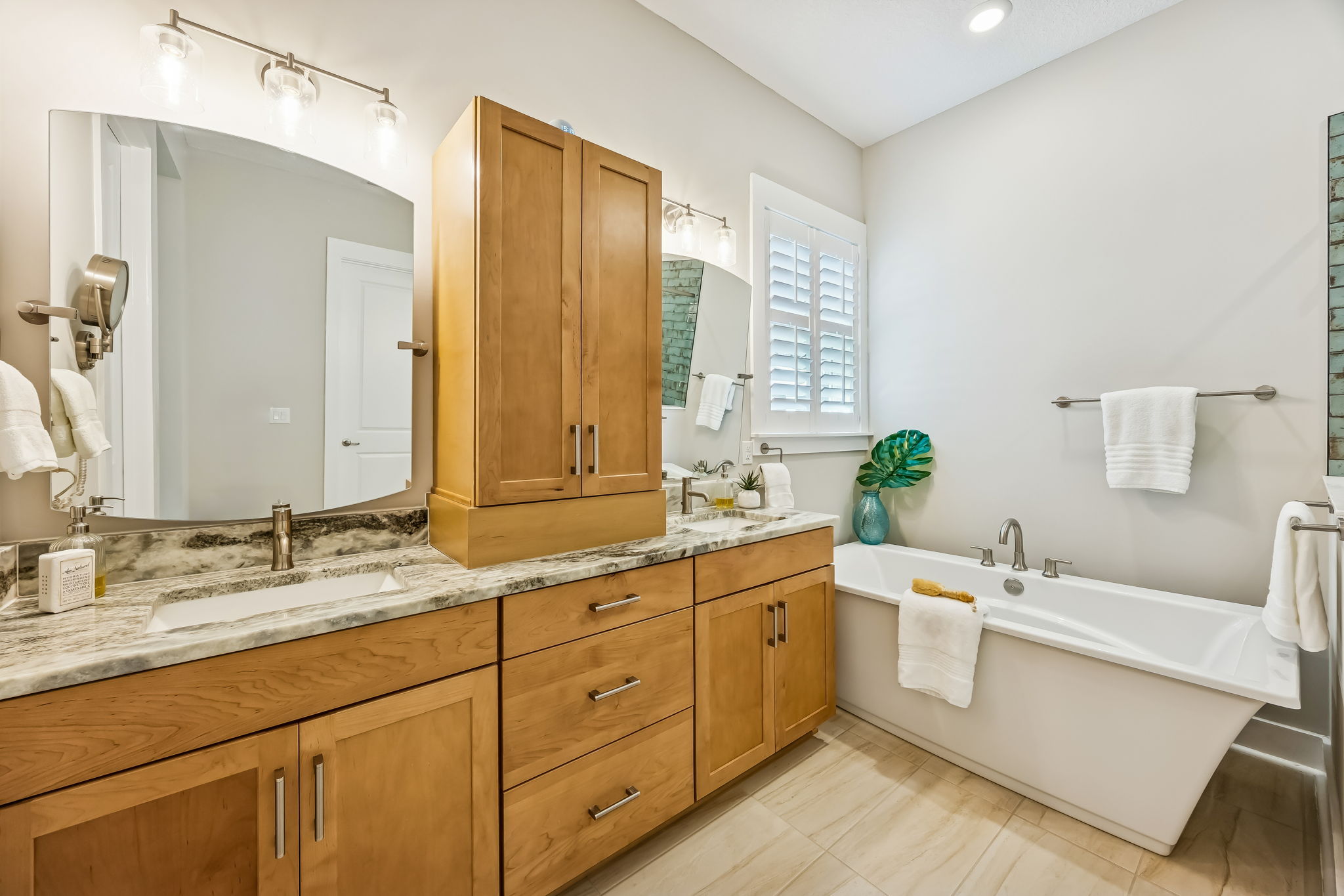 ... substantial granite countertops, dual sink stations ...