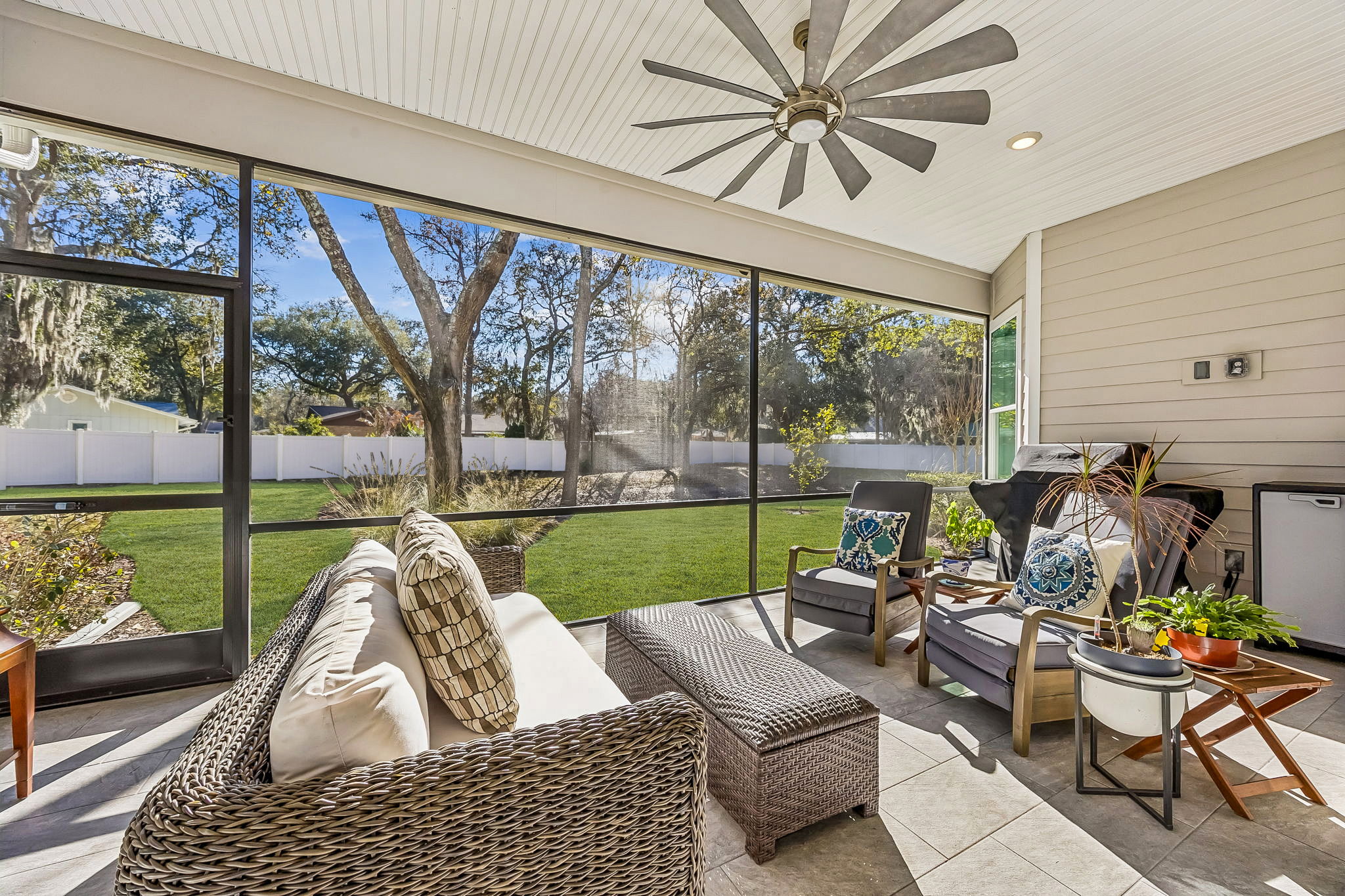 A peaceful screened lanai extends the living space outdoors ...