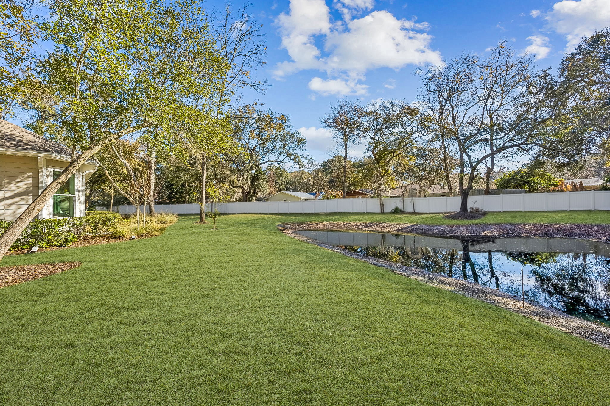... and overlooks a tranquil HOA-maintained pond