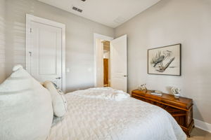 ... and both feature ample storage, including a walk-in closet in this bedroom
