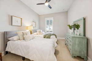 A spacious second guest bedroom easily accommodates a king or queen bed ...