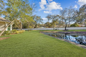 ... and overlooks a tranquil HOA-maintained pond
