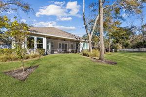 A generously sized backyard provides room for recreation ...