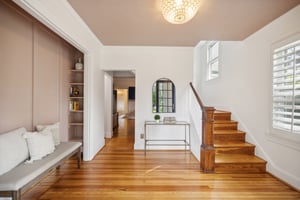 Main Level Foyer with with newly refinished original heart pine floors