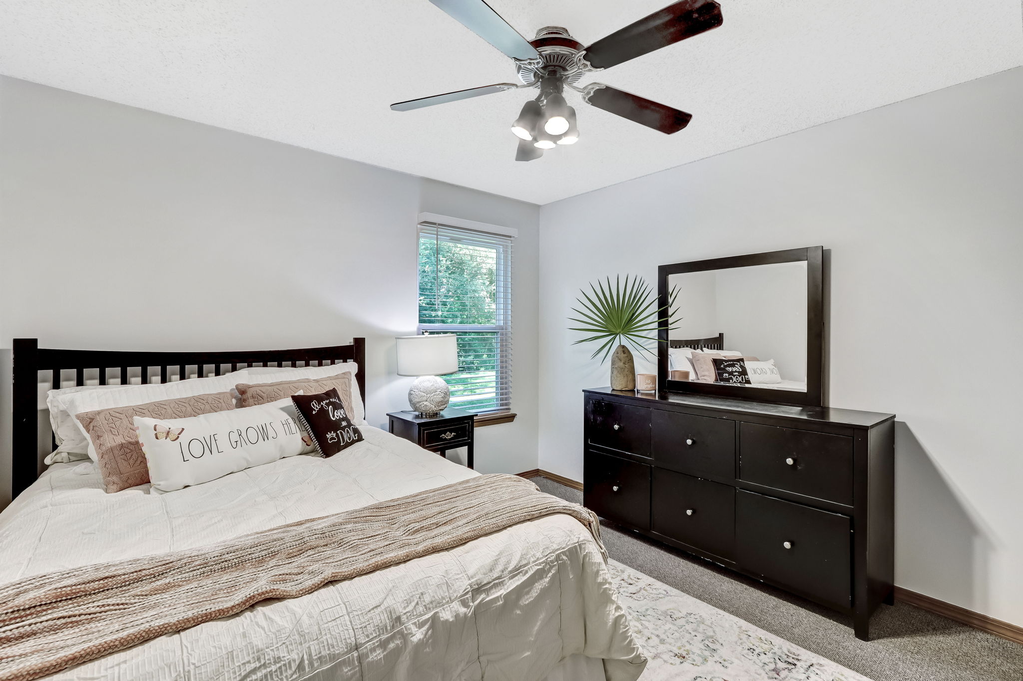 Large guest bedroom with space to accommodate a king-sized set ...