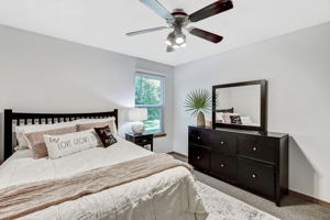 Large guest bedroom with space to accommodate a king-sized set ...